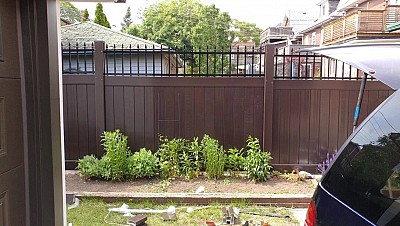 Dark Brown Privacy fence with Black Alum
