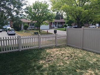 Tan Cape Cod Picket fence