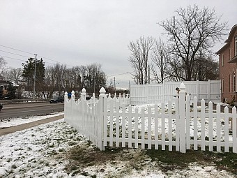 White vinyl Scallop picket fence with Gothic caps