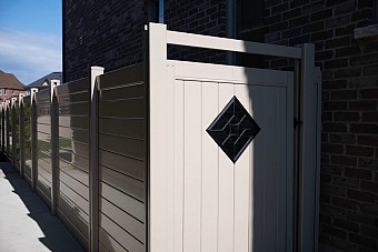 Tan, privacy Gate with metal insert